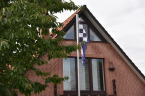 Гостиница Ferienwohnung Haus Fischer  Лангведель